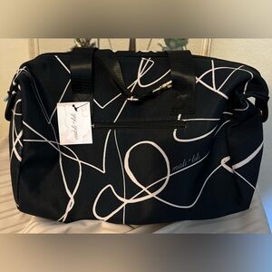 NWT Mali + Lili weekend bag in black and white design on canvas. Plenty of room